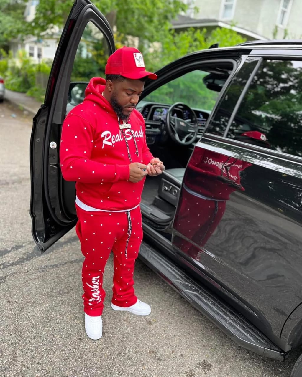 Print Sweatsuit Full-Zip featuring a zip-up hoodie and matching jogger pants in a modern all-over design.