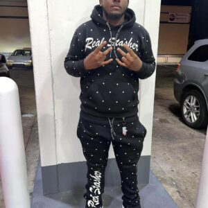 Allover printing sweatsuit with a matching hoodie and jogger pants featuring a continuous bold pattern.