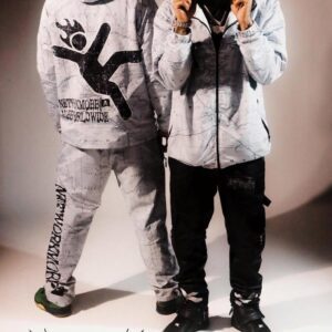 Windbreaker Jacket & Flare Pants styled together in a coordinated outfit featuring a lightweight windbreaker jacket and trendy flare pants