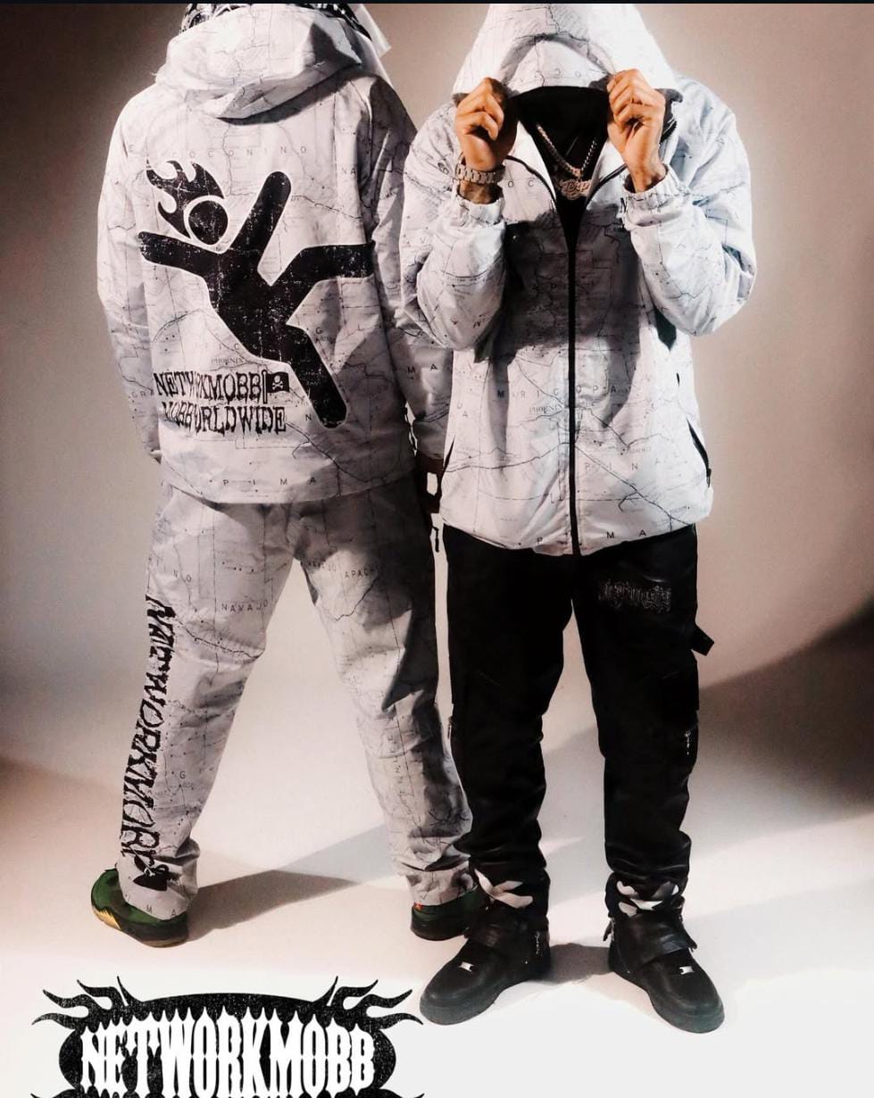 Windbreaker Jacket & Flare Pants styled together in a coordinated outfit featuring a lightweight windbreaker jacket and trendy flare pants