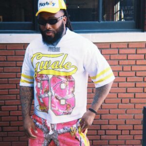 Mesh Panel Jersey & Camo Polyester Jogger styled as a coordinated outfit featuring a breathable mesh panel jersey and camo polyester jogger pants