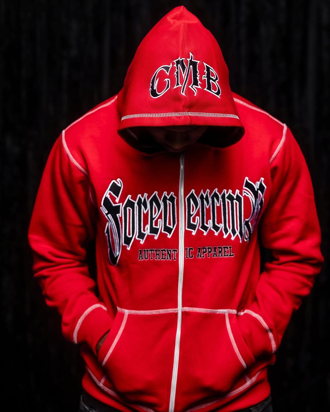 Soft cotton fleece hoodie with a relaxed fit, long sleeves, ribbed cuffs, and adjustable drawstring hood for everyday comfort.