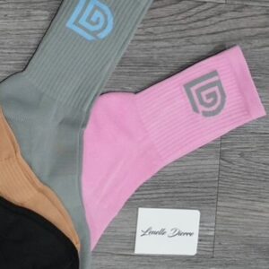 Four types of Streetwear showcased through knitted logo socks styled with modern street fashion and minimalist urban footwear
